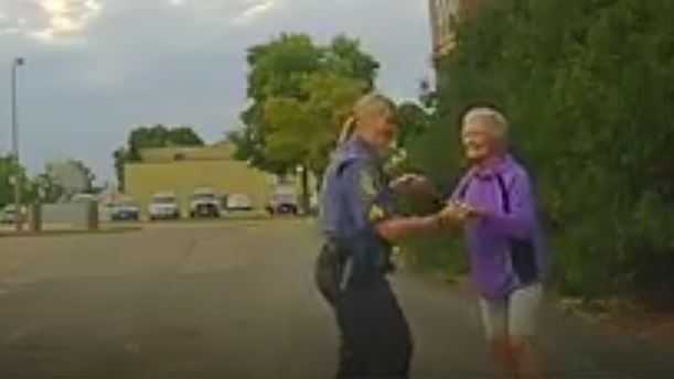 Cop, 92-year-old woman's parking lot dance party goes viral