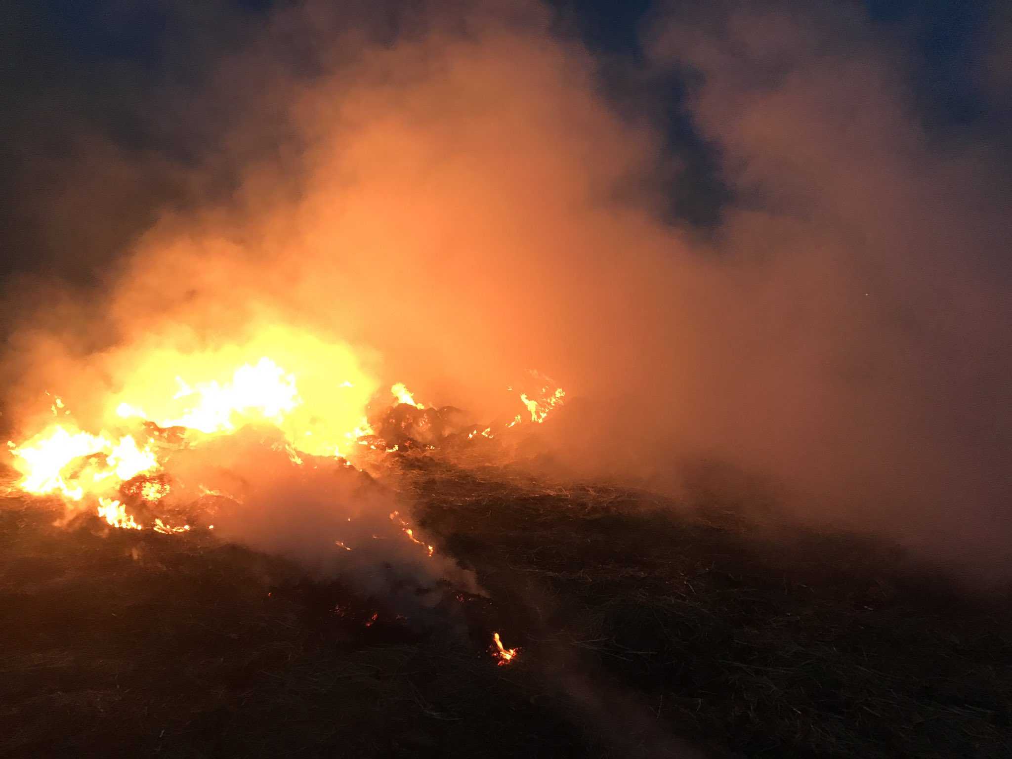 Hay fire smolders out in Elk Grove near Hwy. 99