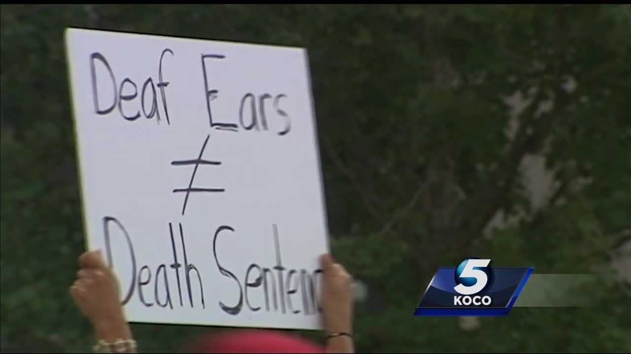 Hundreds march, demand change after officer fatally shoots deaf man