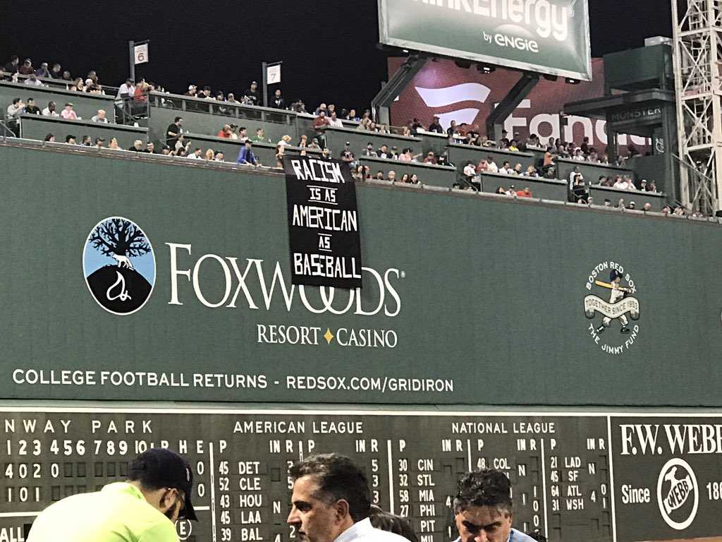 Fans unfurl racism banner from Green Monster during Red Sox game