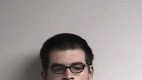 This undated image provided by the Elizabeth City Police Department shows Bradley Hardison. A North Carolina man who made headlines when he was caught for break-ins after winning a doughnut-eating contest has been arrested again. The Virginian-Pilot newspaper reports that Hardison was charged Thursday, Jan. 18, 2018, with stealing from a Dunkin' Donuts in November. 