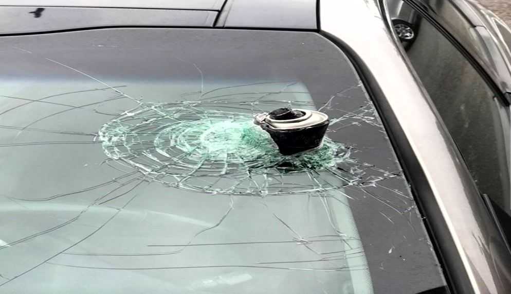 Exploding can of hairspray shatters woman's windshield