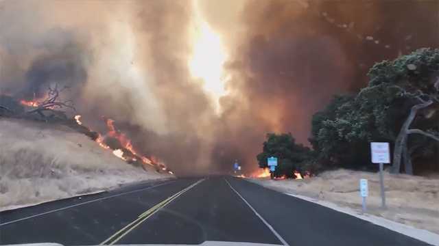 Forest patrolman helps rescue campers from wildfire