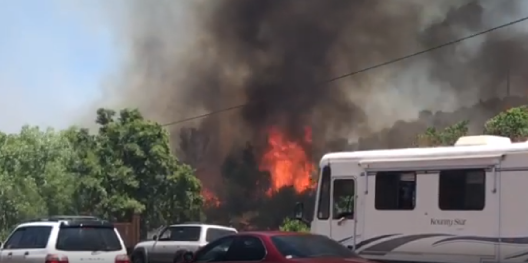 Crews contain brush fire in Tijeras