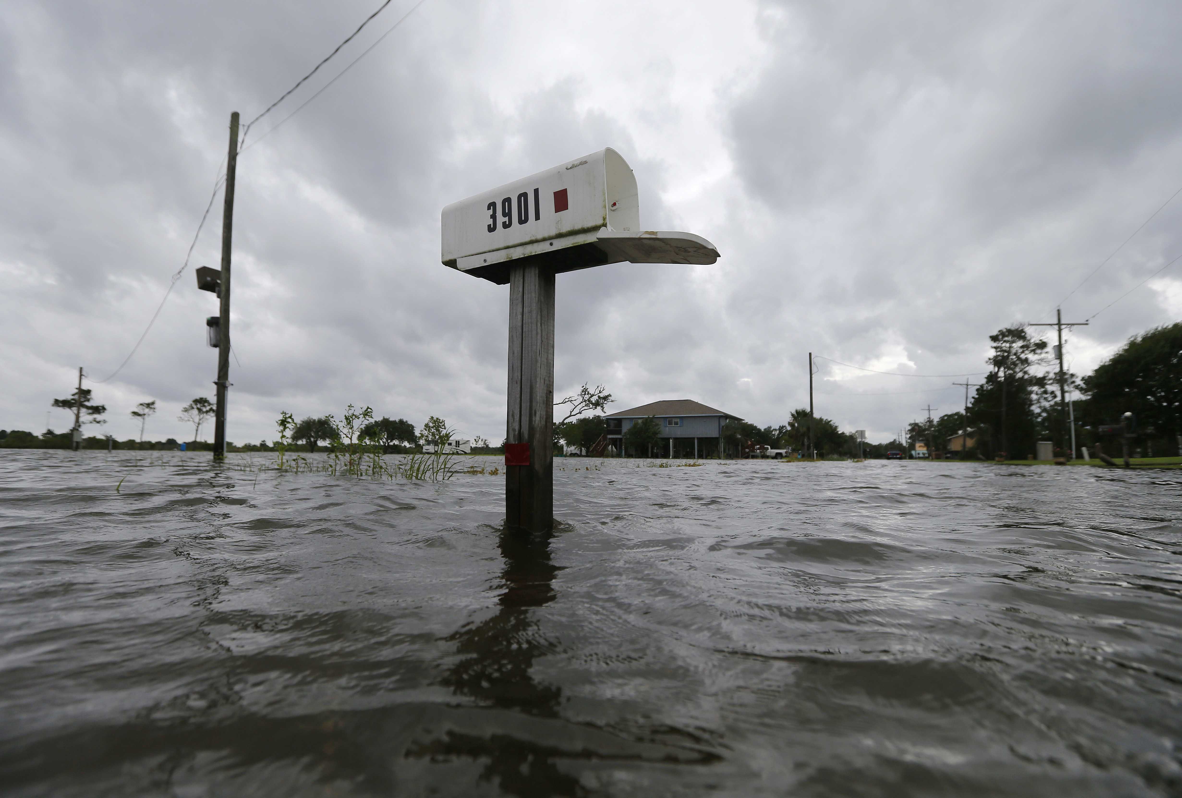 Cindy weakens but still stirs weather over wide swath