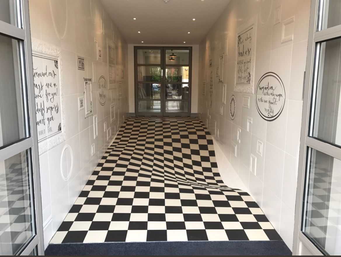 This flooring company made their entrance a crazy optical illusion