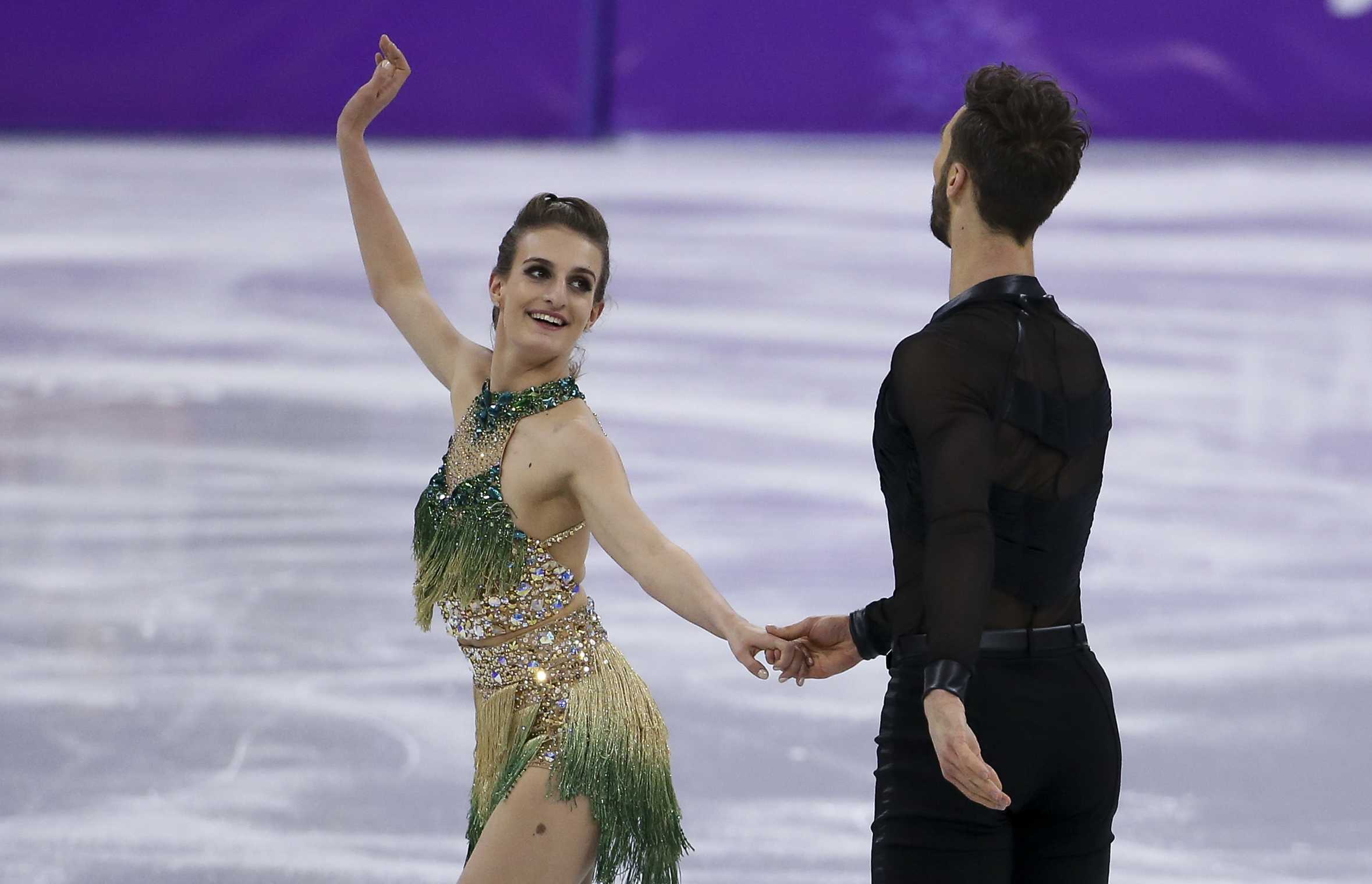 Wardrobe malfunction leaves French ice dancer exposed during Olympic performance