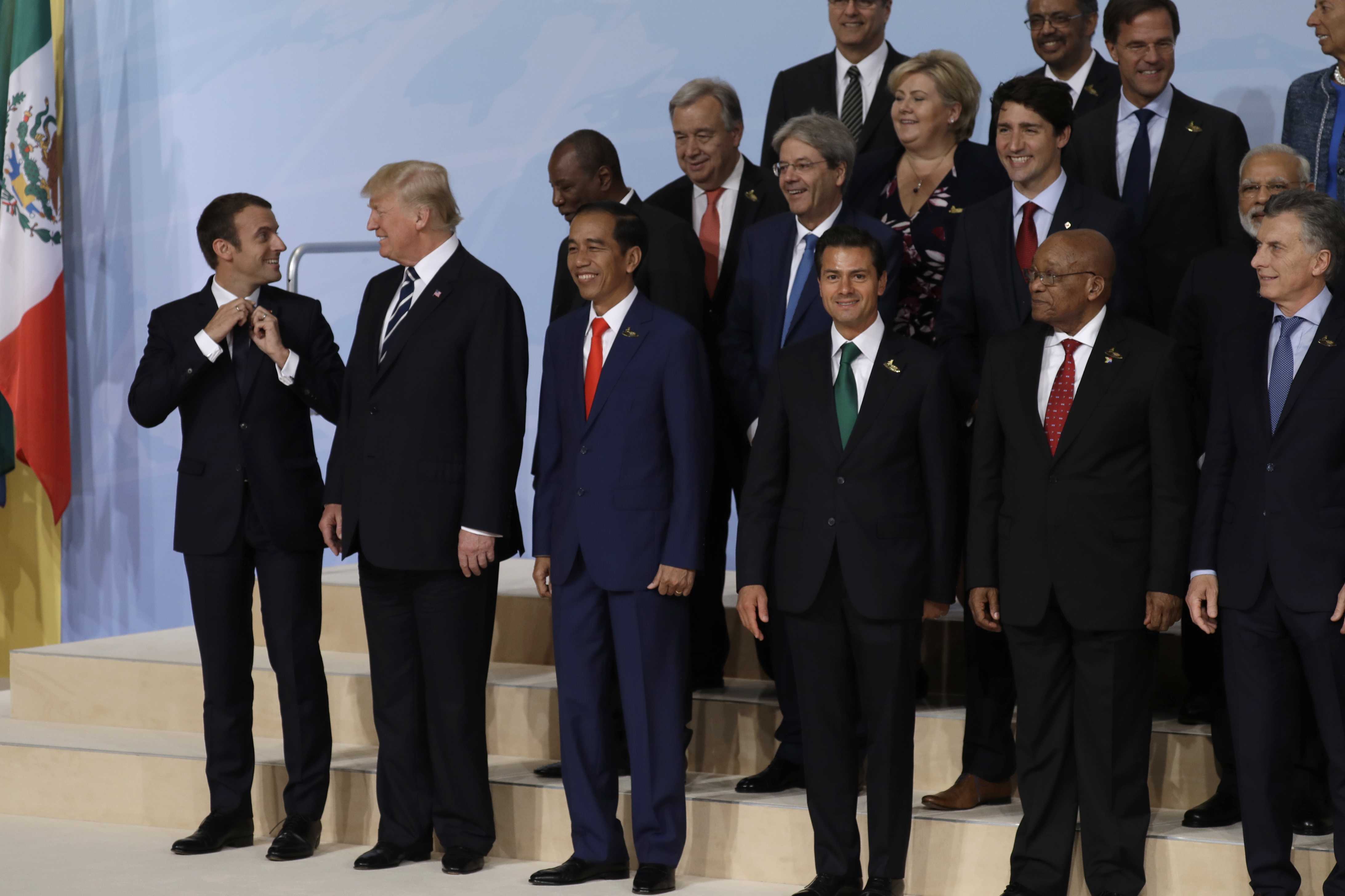 G-20 leaders shut out Trump on climate, strike deal on trade