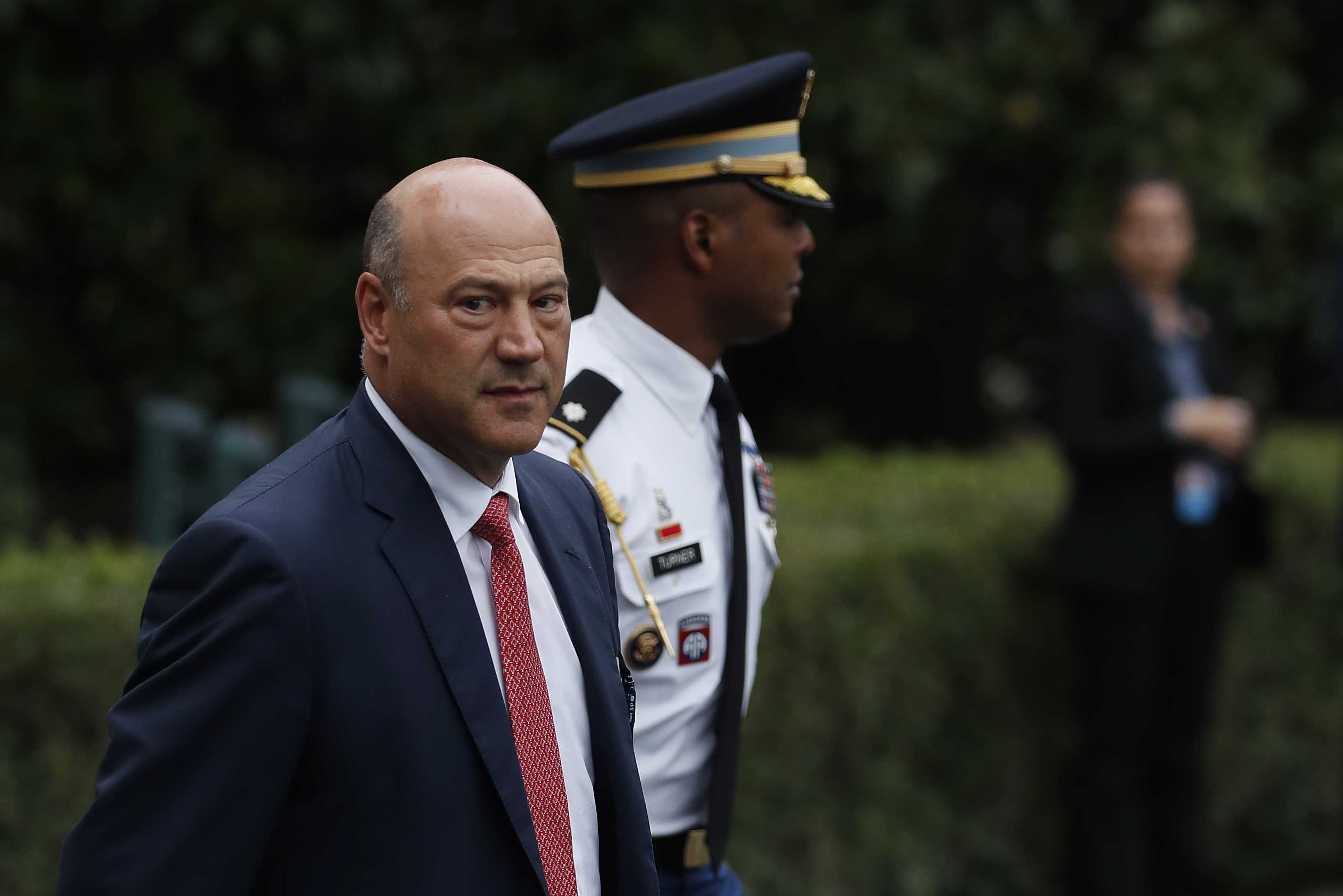 Trump economic adviser Cohn says he’ll stay put