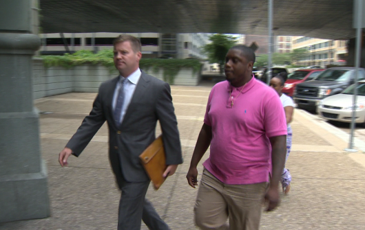 Suspect in shooting of man with young child surrenders