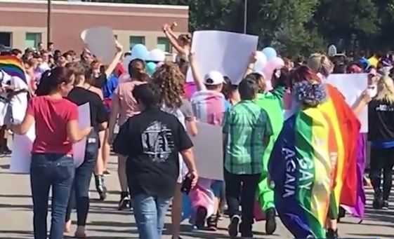 Teens chant 'Make America straight again' during homecoming parade
