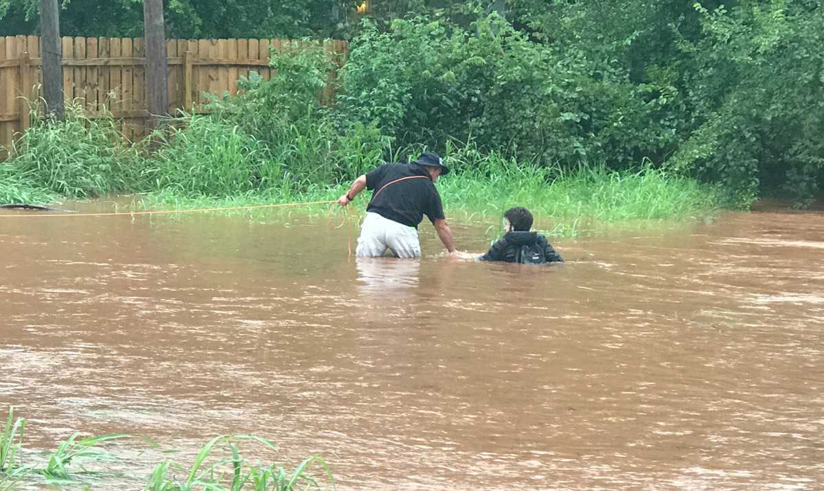 Good Samaritans rescue person stranded in flood waters