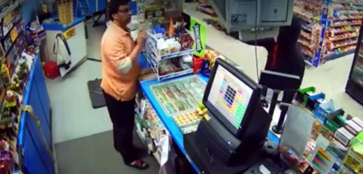 Bullet barely misses clerk in robbery