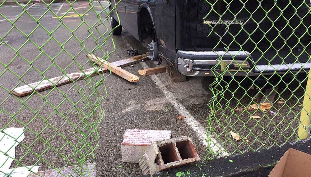 Police: Man found dead under van that fell on him while trying to steal wheels