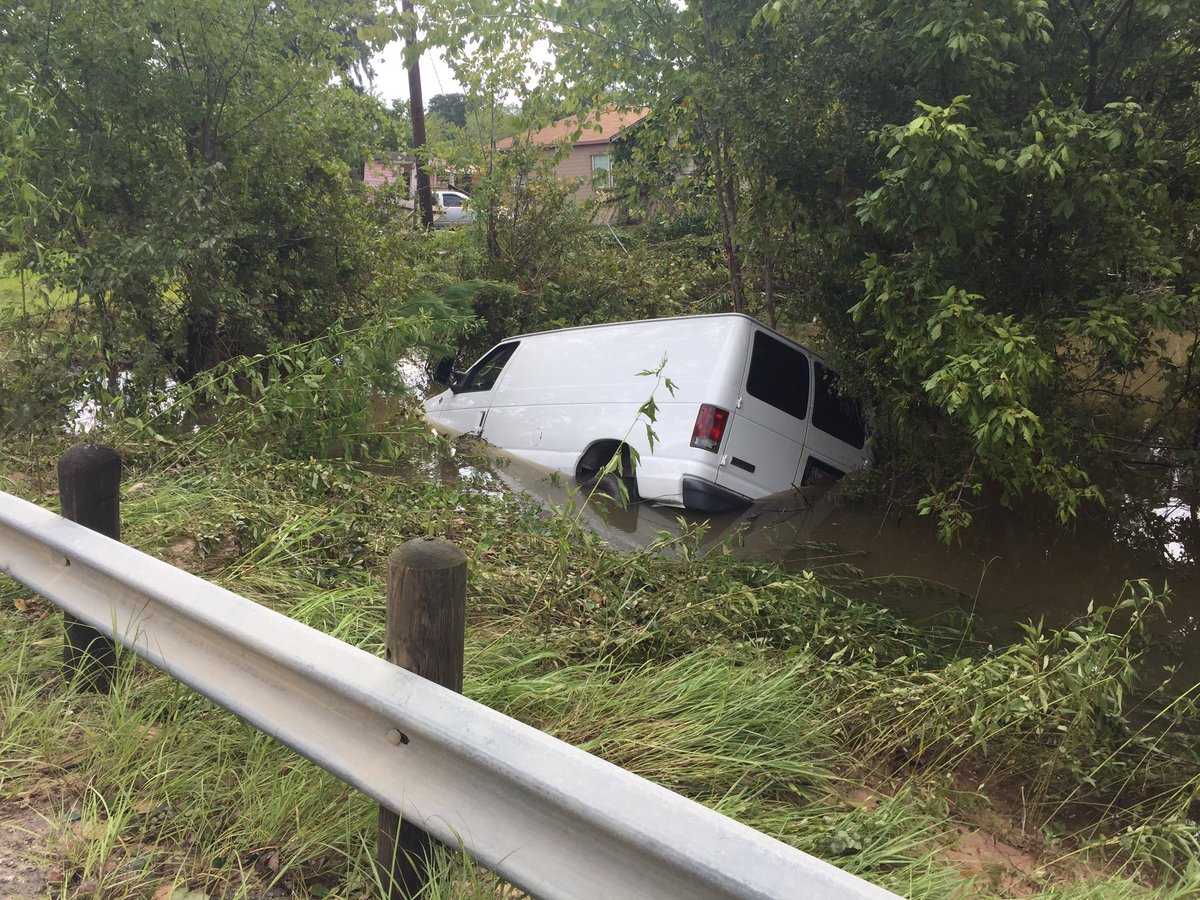 Van swept away while carrying 6 family members found in flooded bayou