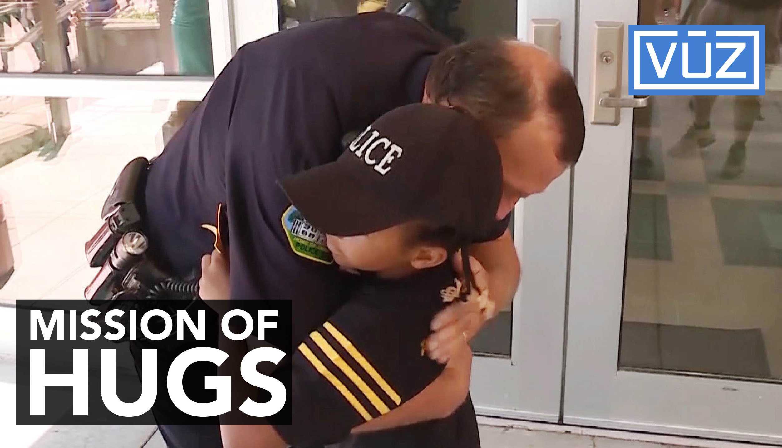 Young girl's Mission: Hug as many police officers as possible