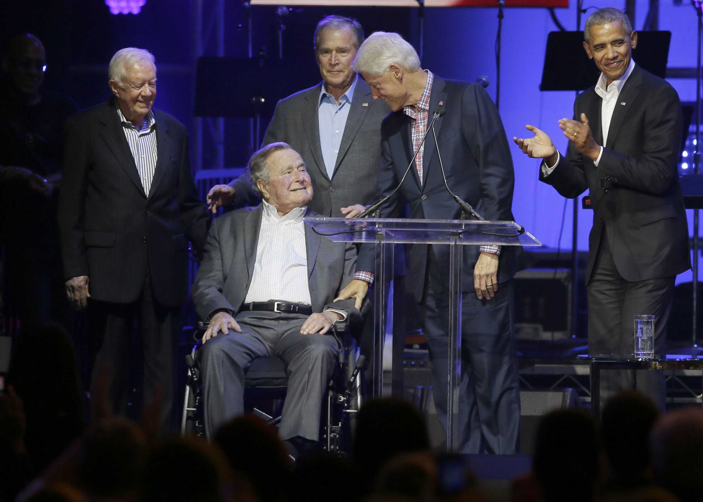 Former presidents call for unity at hurricane relief concert