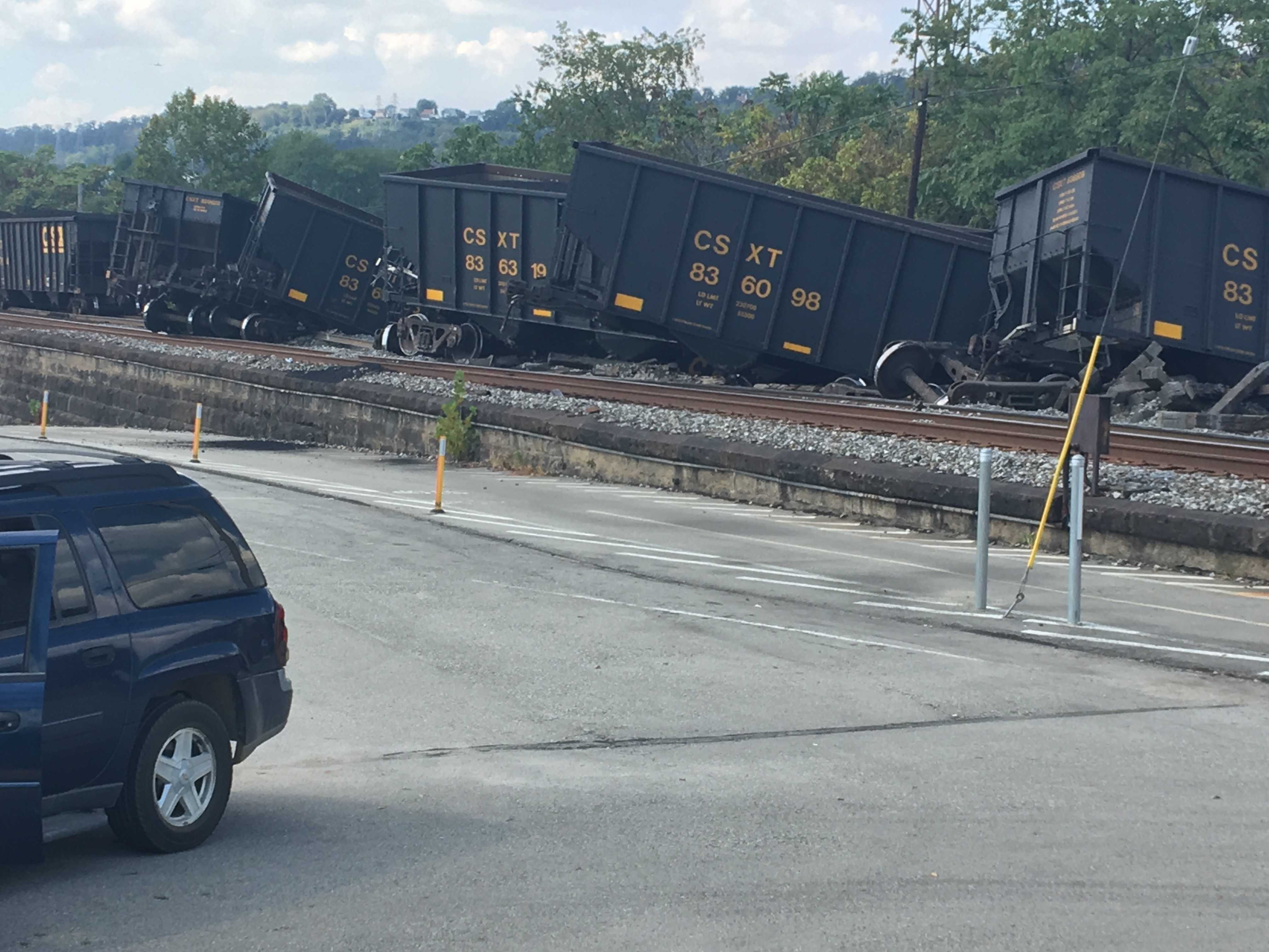 Train derails in McKeesport, spilling coal and knocking down live wires