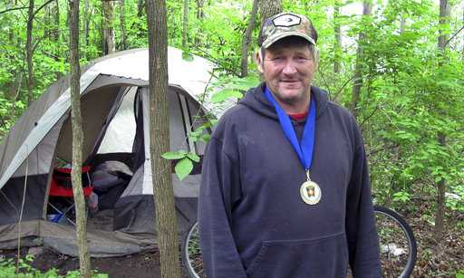 Homeless man hailed for saving life still living in woods