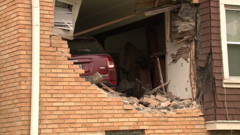 Airborne Jeep slams into apartment living room