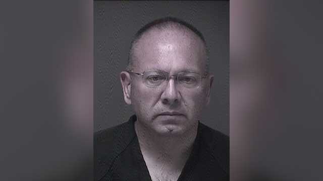 Priest kept child porn as 'revenge' on God for poker losses