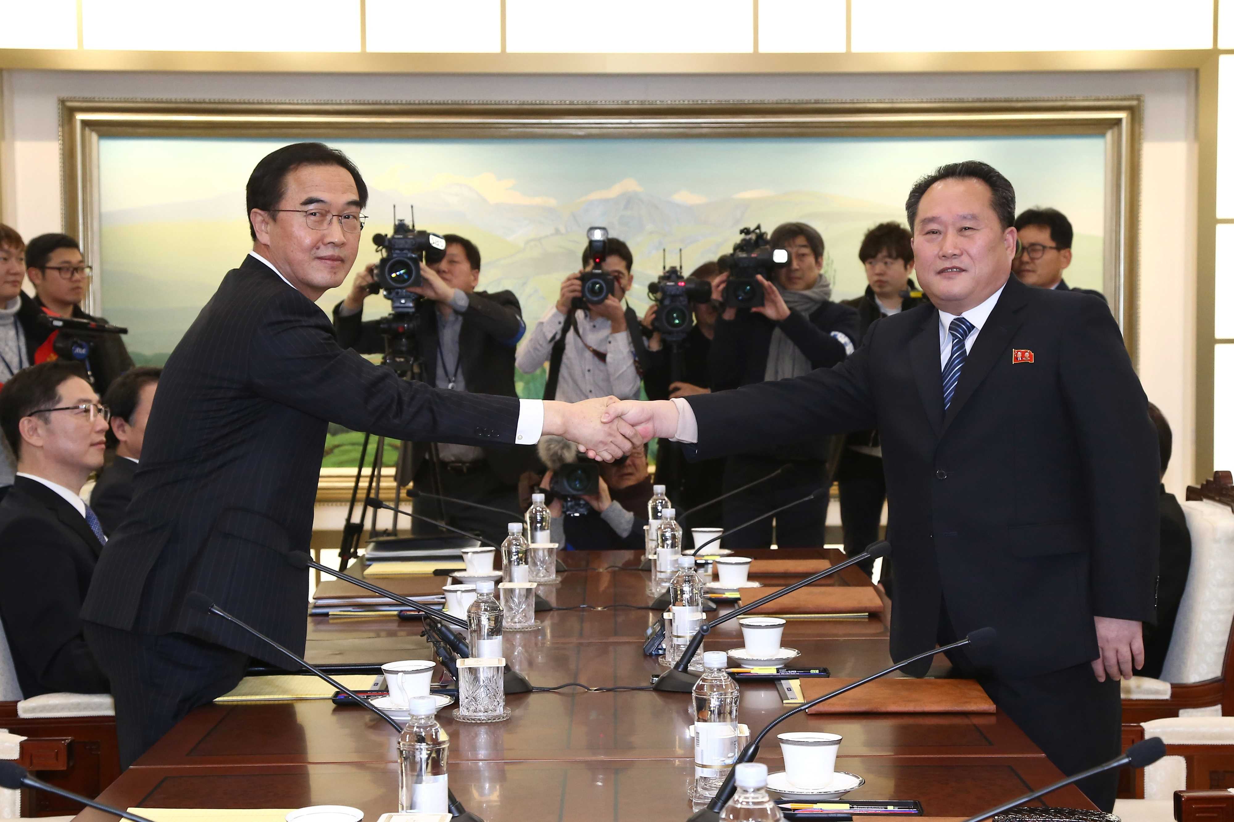 North Korean state media hail talks with South as path to reunification