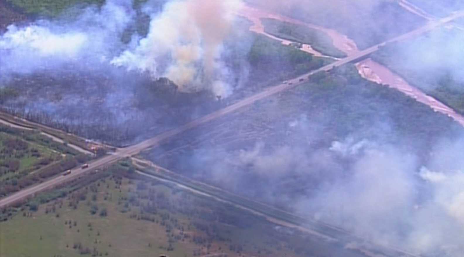 Brush fire burning near I-25 in Socorro County