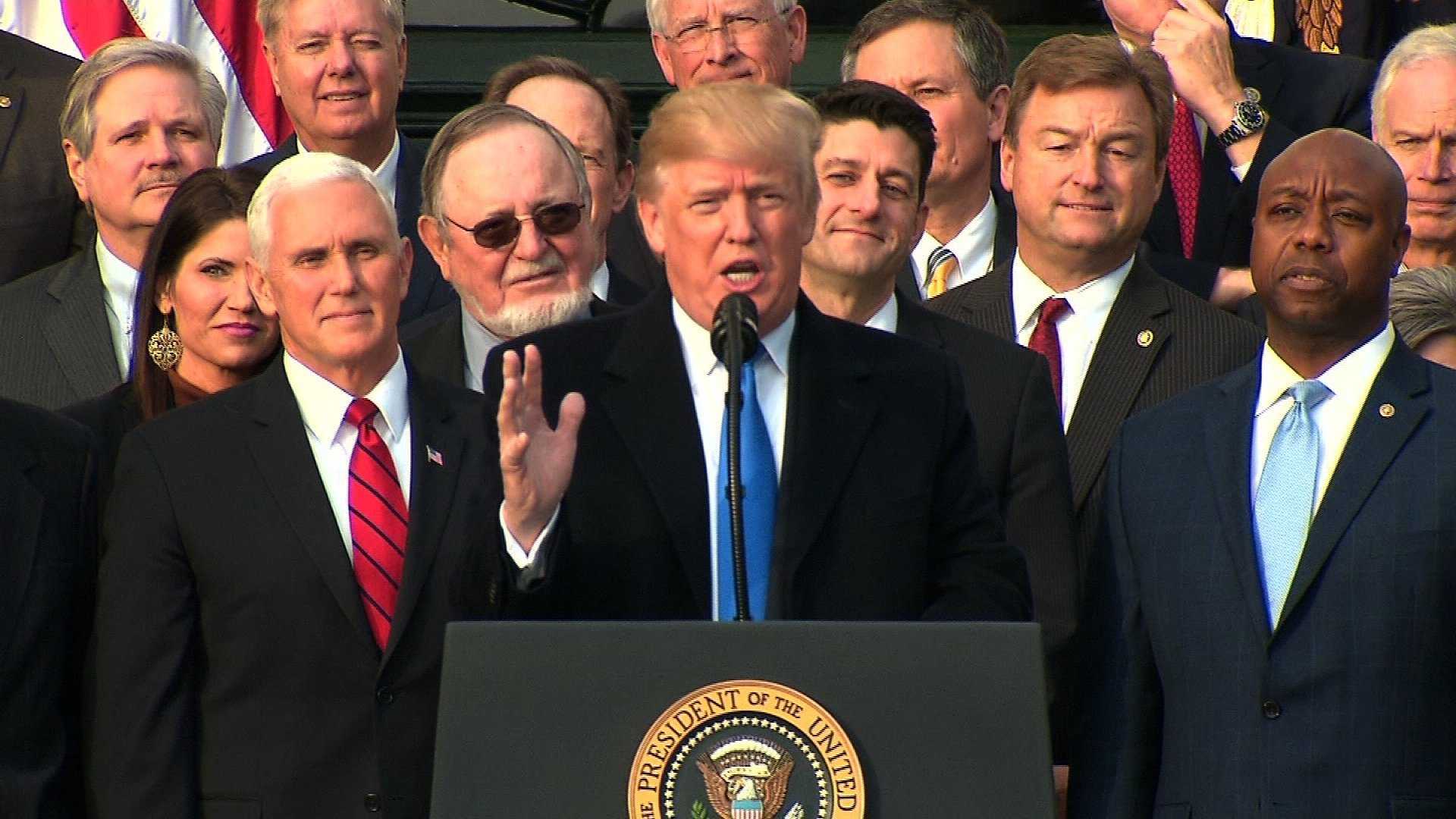 President Trump signs GOP's sweeping tax bill into law