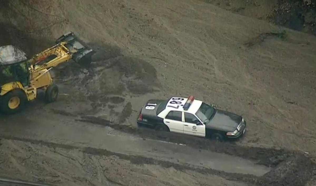 California mudslides: Searchers find man's body, up death toll to 18