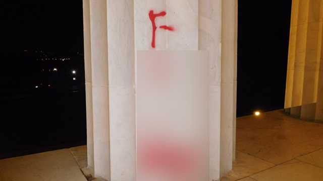 Lincoln Memorial tagged with vulgar graffiti