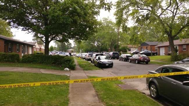 Police say mother arrested after 2 children shot in the head