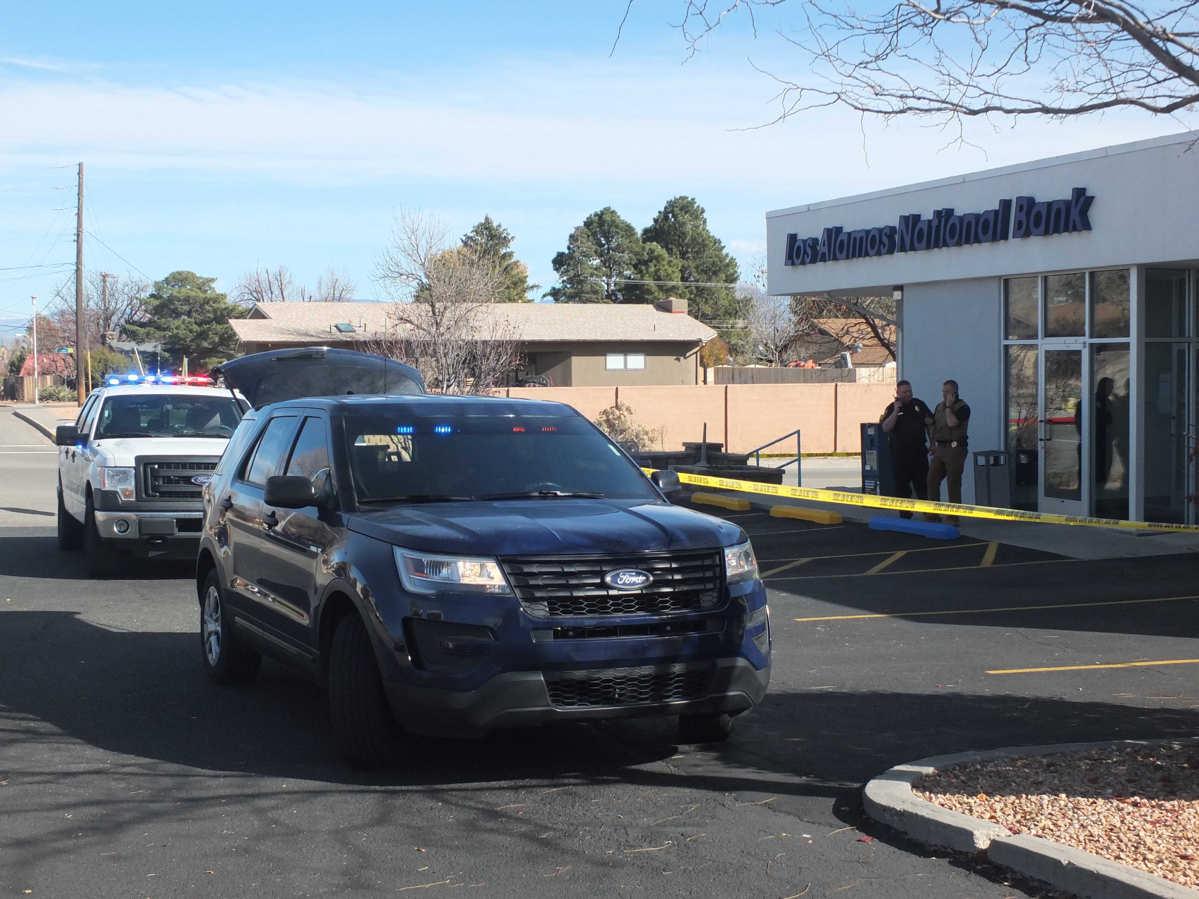 Search for armed robber prompts school lockdowns