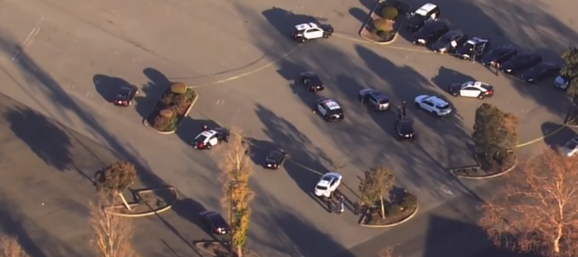 Officer under investigation for child sex abuse kills self in mall parking lot