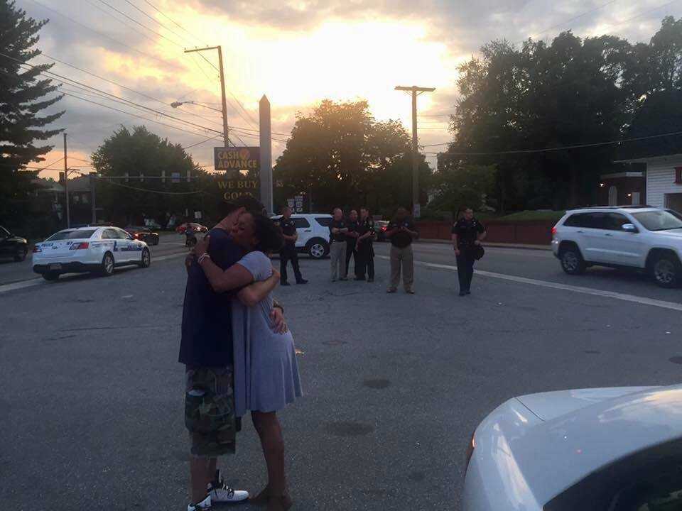'If I were KKK, would I hold you like this?' Viral photo shows peace amid monument controversy