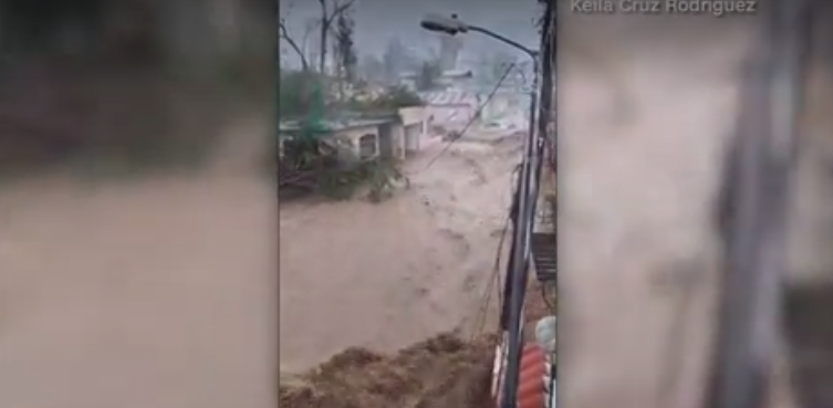 Video shows flood waters from Hurricane Maria rush down street