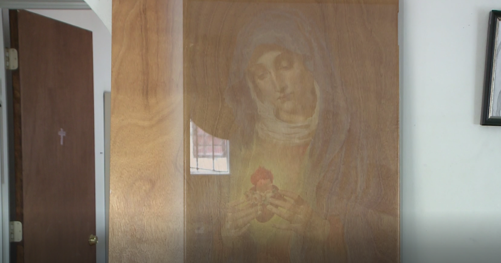 Man sees Virgin Mary in closet door