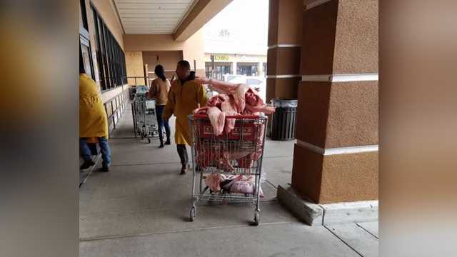 Report: Workers fired after photos of unwrapped meat in shopping carts go viral