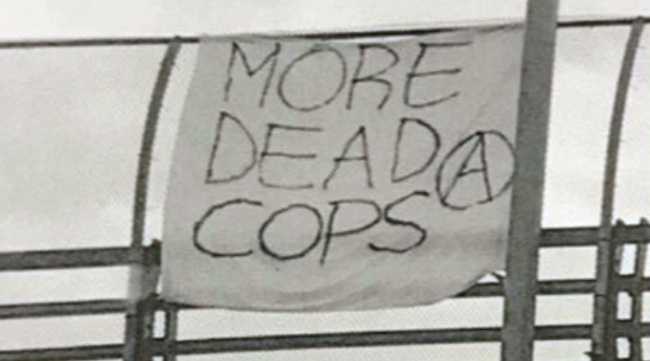 'More Dead Cops' banner hung from overpass outrages community