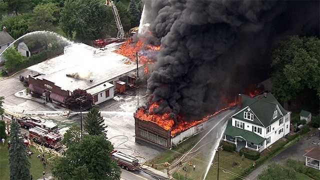 Firefighters from several Maryland counties work to battle structure fire