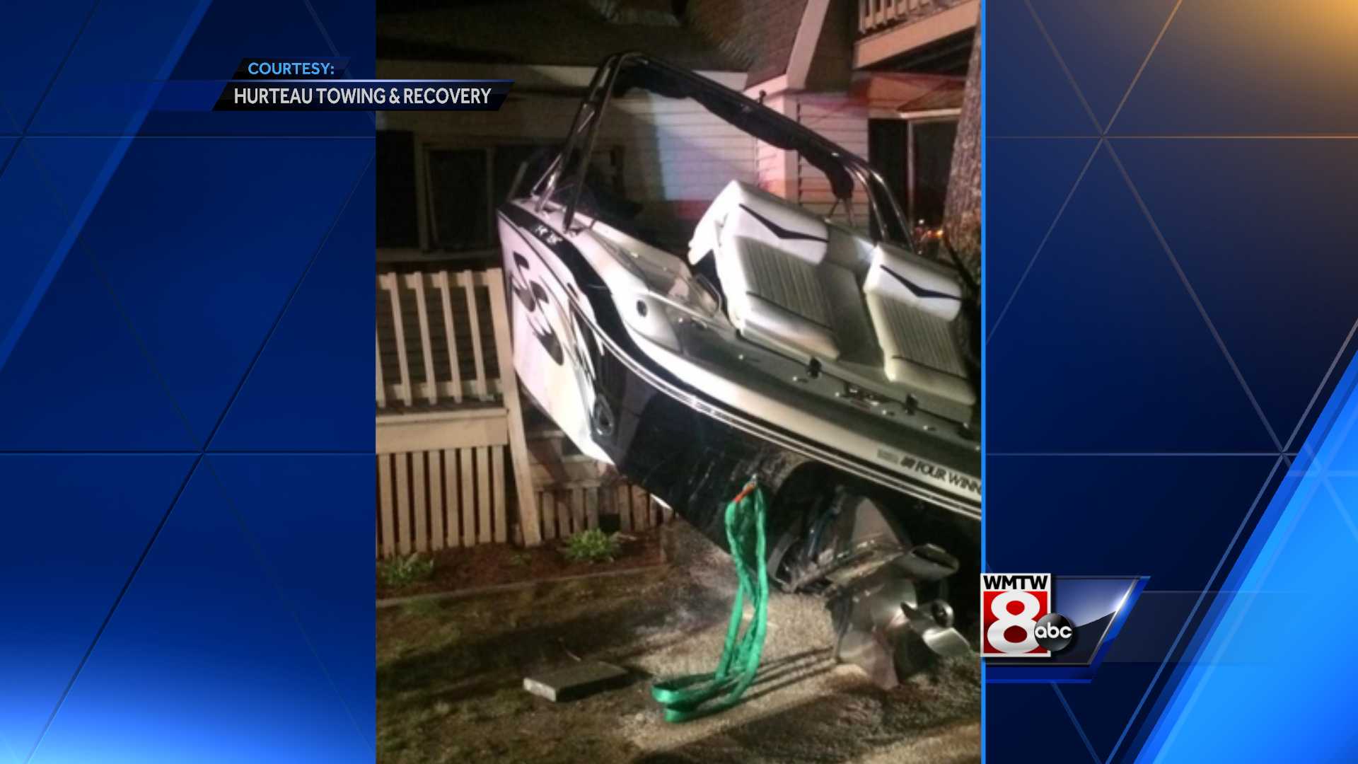 Stolen boat crashes through house on New Hampshire lake Stolen boat crashes through house on New Hampshire lake