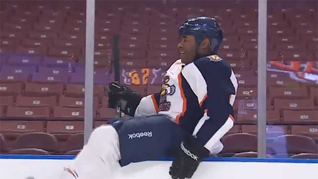News anchor relearns ice-skating moves from hockey players