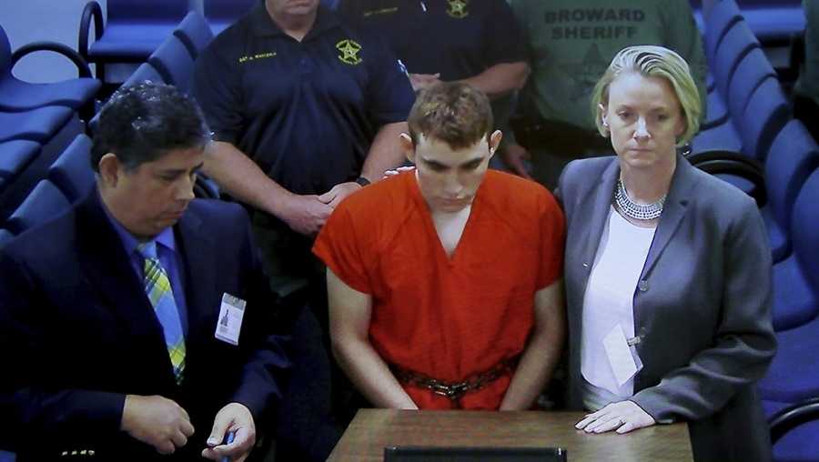 Florida shooting suspect was part of white nationalist group, leader says