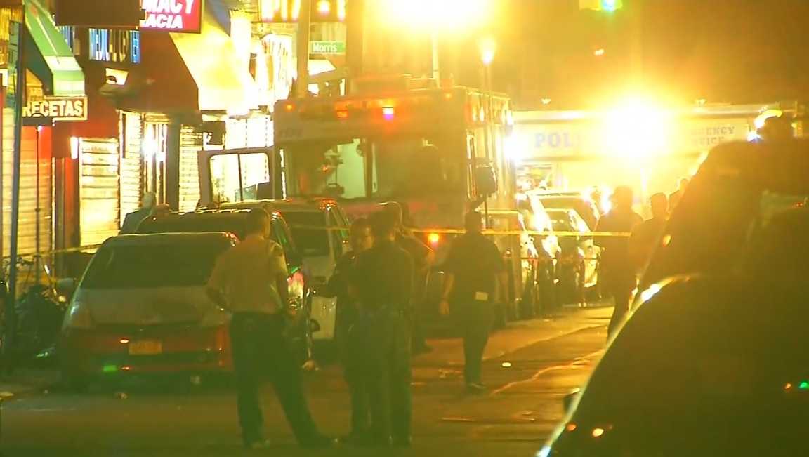 NYPD officer 'assassinated' while sitting in police vehicle