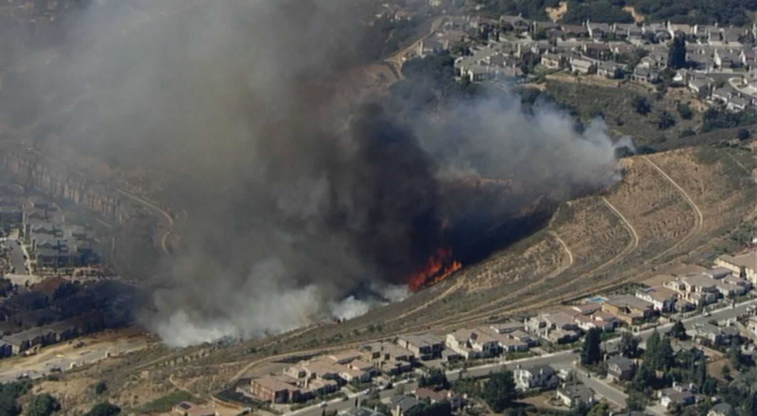 50 homes threatened by fast-moving Oakland Hills fire