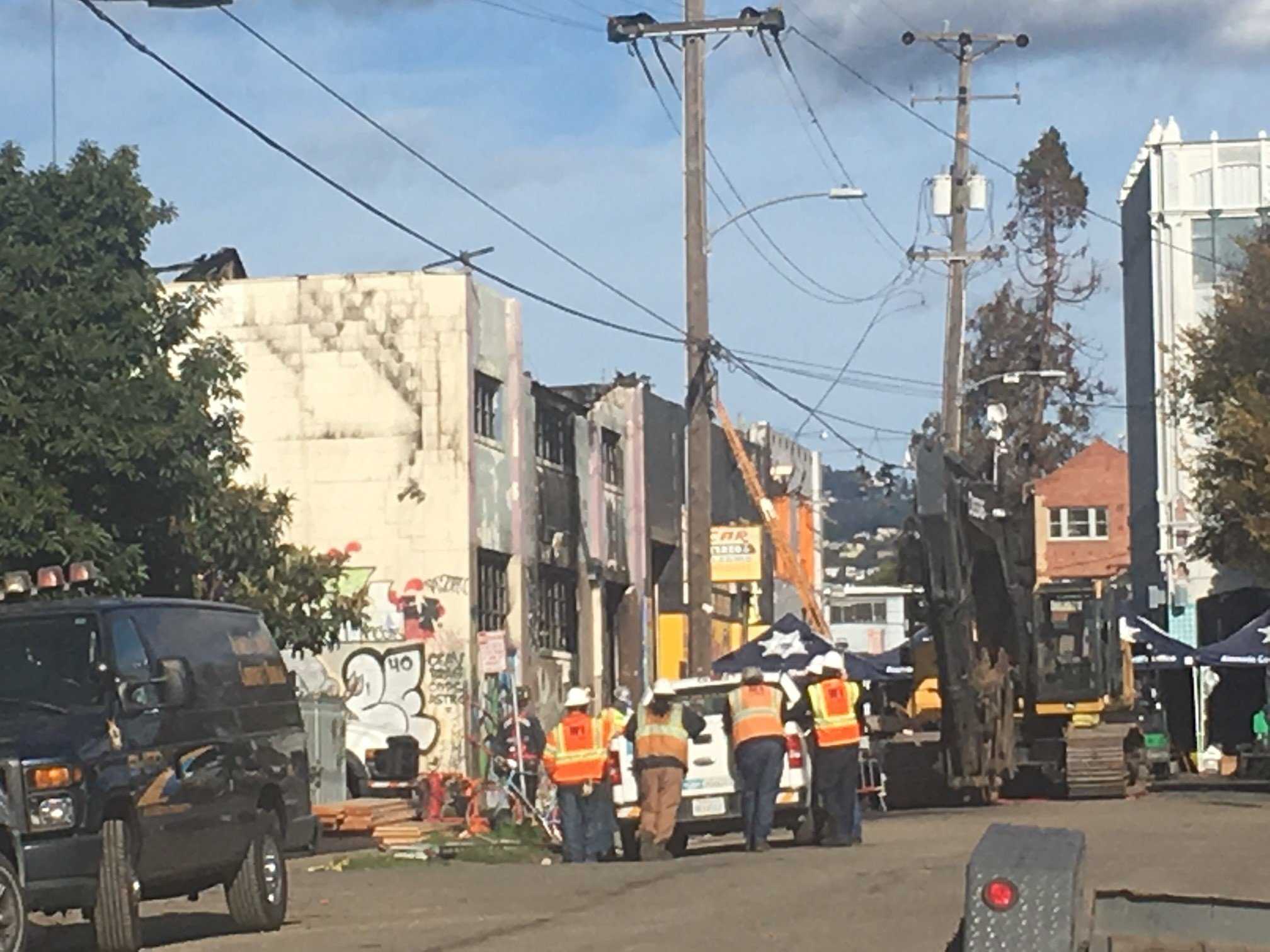 2 men charged in deadly warehouse fire want lower bail