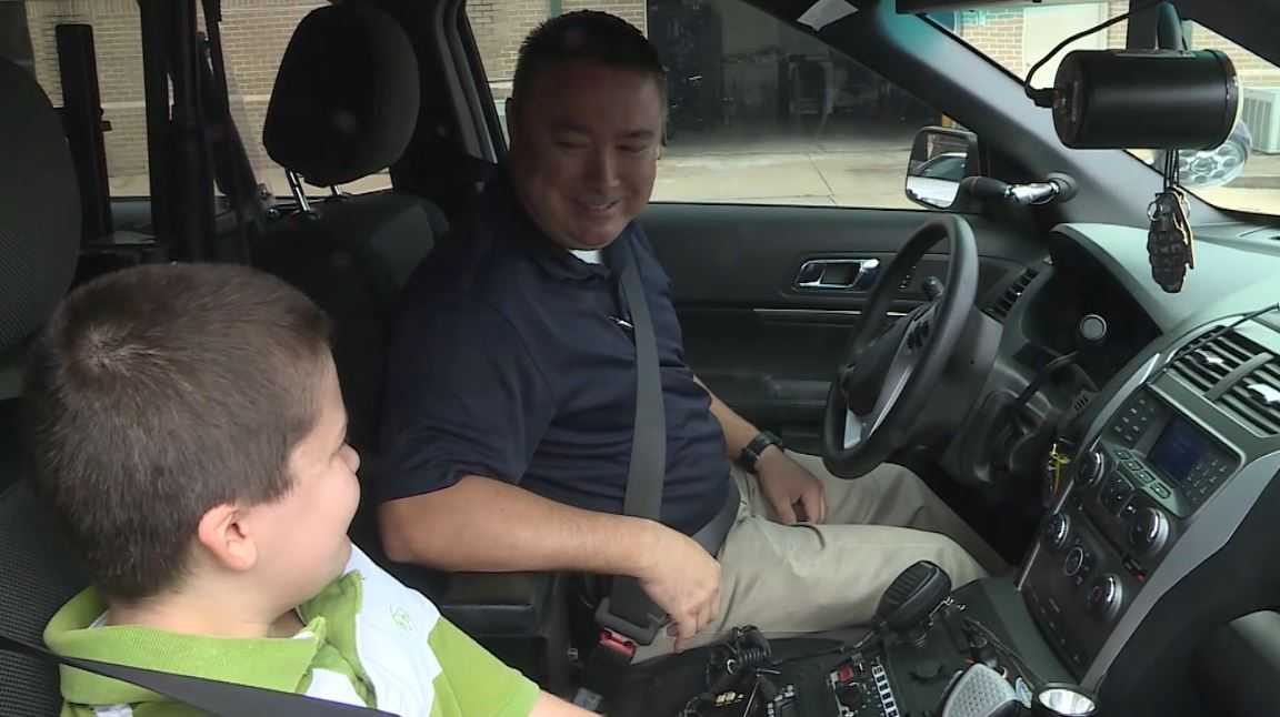 Officer adopts child he helped rescue from abuse