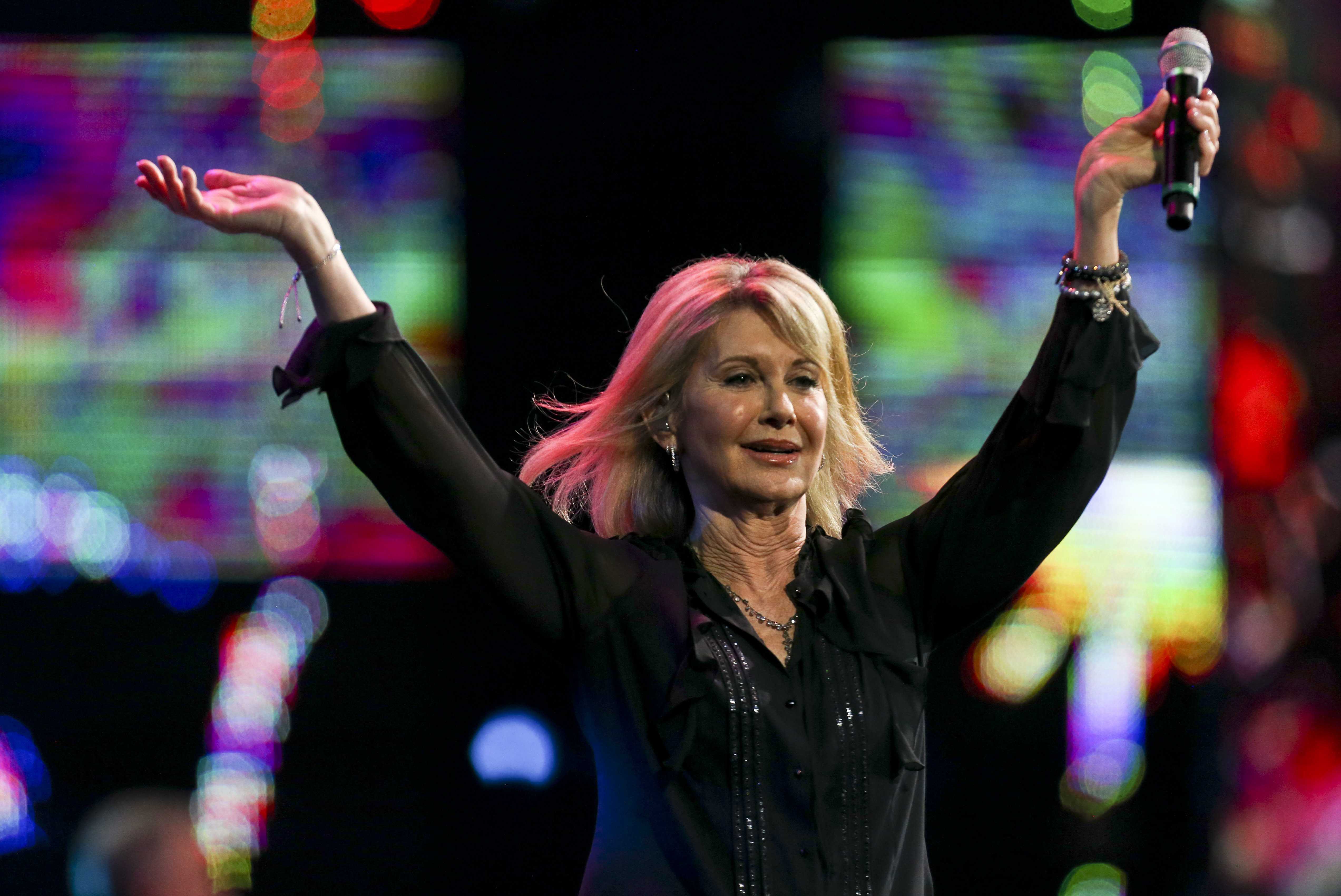 Olivia Newton-John cancels tour dates after being diagnosed with breast cancer