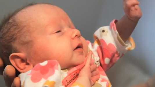 Police officer adopts homeless mother's opioid-addicted newborn