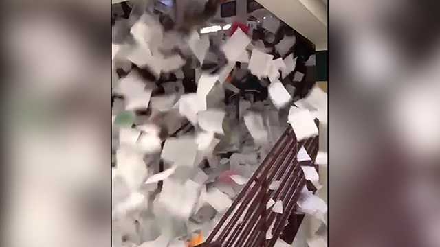 High school students' paper waterfall just keeps going