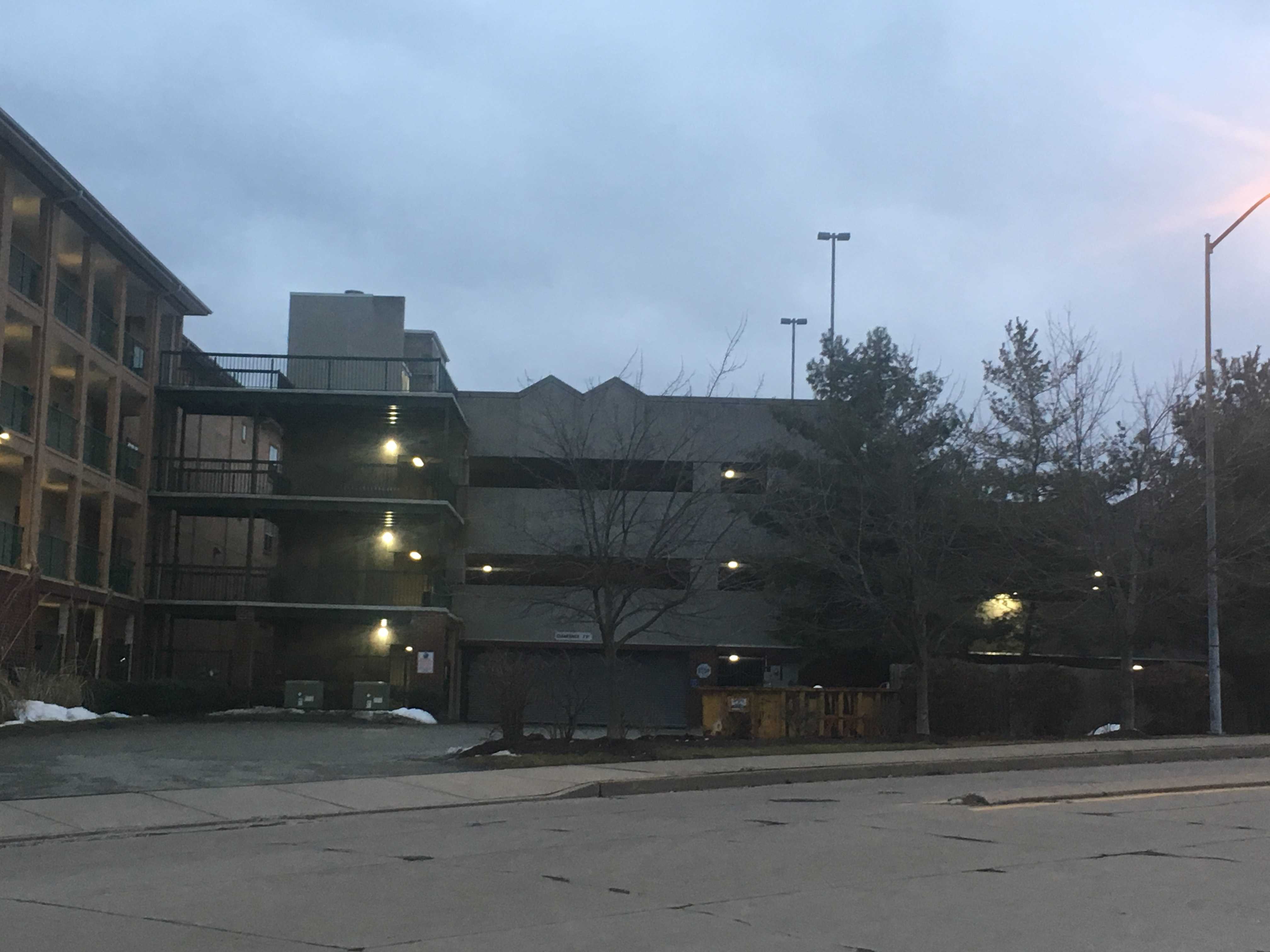 Man jumps from parking garage in attempt to run from police